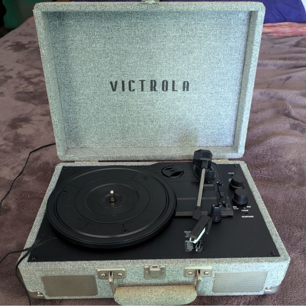 Victrola record player and vinyl/disc sets